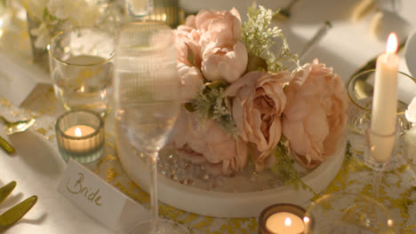 Close-Up-Of-Bouquet-On-Table-Set-For-Meal-At-Wedding-Reception-With-Place-Card-For-Bride-2